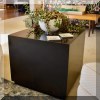 F11. Black cube-shaped side table. 18”h x 20”w x 20”d 